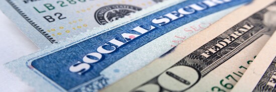 Social security card and American money dollar bills