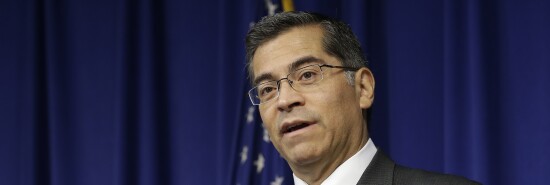 California Attorney General Xavier Becerra speaks at a news conference.