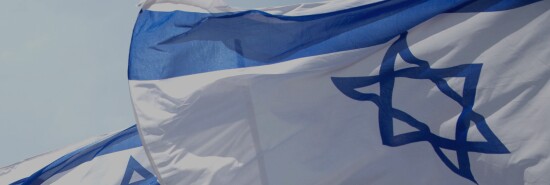 Israeli flags are seen.