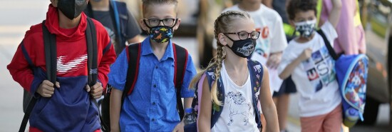 Virus Outbreak School Masks