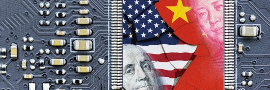 Flag of USA and China on a processor, CPU or GPU microchip on a motherboard. US companies have become the latest collateral damage in US - China tech war. US limits, restricts AI chips sales to China.