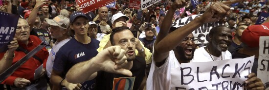 Trump rally-goers boo press