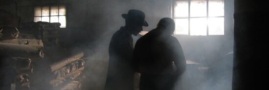 Silhouette of Men in Smoke