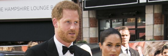 Britain's Prince Harry, left, and Meghan, Duchess of Sussex arrive at the 'Lion King' European premiere in central London.