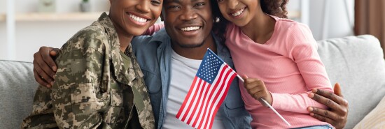 Beautiful black family celebrating reunion at home