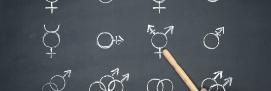gender symbols on blackboard