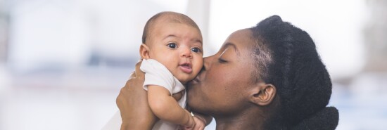 Mother holding infant