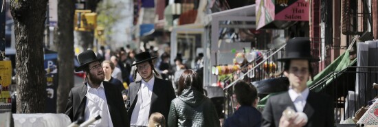 The streets in an orthodox Jewish section of Brooklyn are busy in New York.