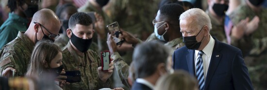 U.S. President Joe Biden greets U.S. military personnel and their families at RAF Mildenhall in Suffolk.