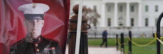 A poster photo of U.S. Marine Corps veteran and Russian prisoner Trevor Reed stands in Lafayette Park near the White House on March 30, 2022, in Washington.