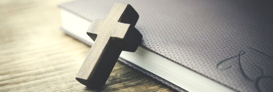 wooden crosses on book