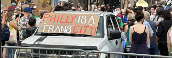 Philadelphia protest signs at Moms for Liberty Summit