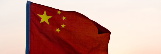 China flag waving in sunset