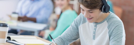 High school student with headphones on