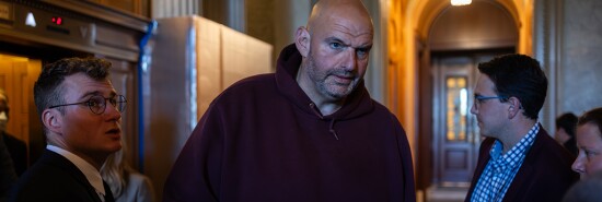 Sen. John Fetterman (D-PA), dressed in a hoodie, leaves the Senate chamber after casting a vote on Sept. 27, 2023. On Wednesday evening, the Senate passed a resolution to reverse an informal guidance from Senate Majority Leader Chuck Schumer (D-NY) that allowed senators to wear informal attire while on the Senate floor.