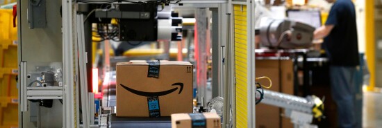 Packages pass through a scanner at an Amazon fulfillment center in Baltimore.