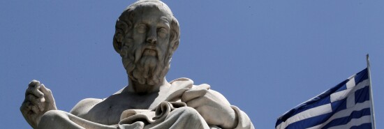 FILE- In this June 5, 2012, file photo, the marble statue of ancient Greek philosopher Plato, stands in front of the Athens Academy, as the Greek flag flies in Athens. Bankers, governments and investors are starting to prepare for Greece to drop the euro currency, a move that could spread turmoil throughout the global financial system. A Greek election on Sunday, June 12, 2012, will go a long way toward determining whether it happens. (AP Photo/Dimitri Messinis, File)