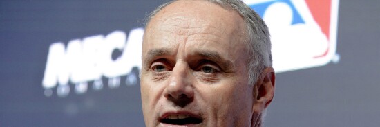 Major League Baseball commissioner Rob Manfred speaks during a news conference.