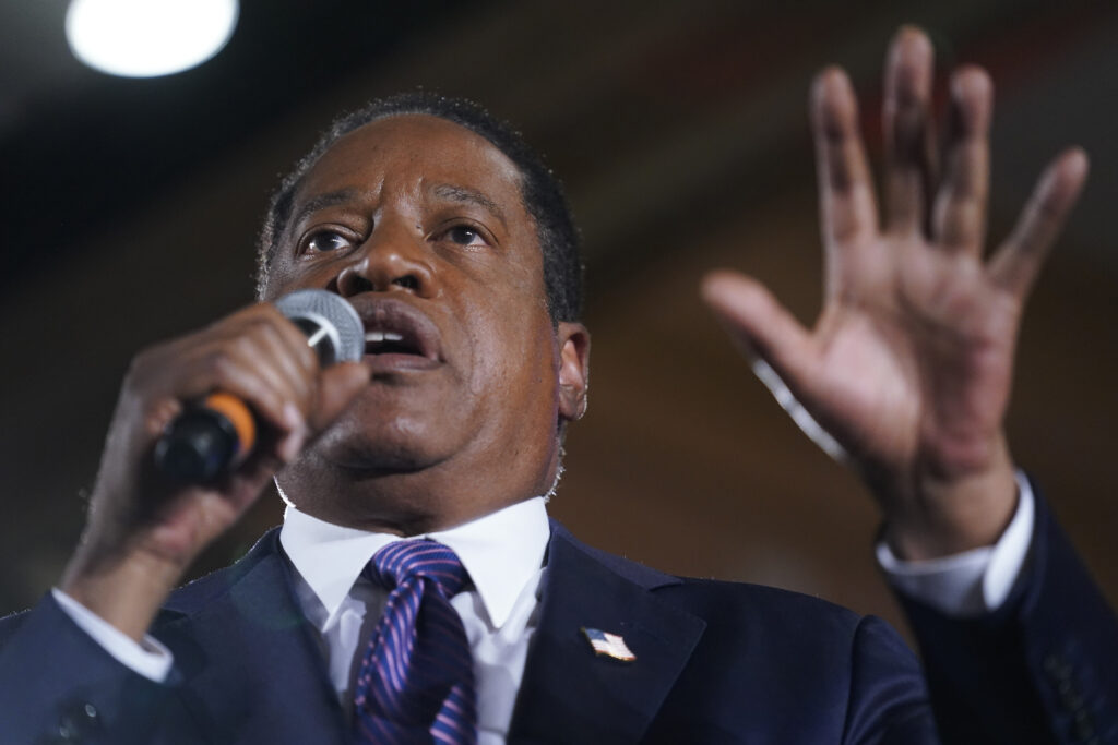 FILE - Republican conservative radio show host Larry Elder speaks to supporters after losing the California gubernatorial recall election on Sept. 14, 2021, in Costa Mesa, California. (AP Photo/Ashley Landis, File)